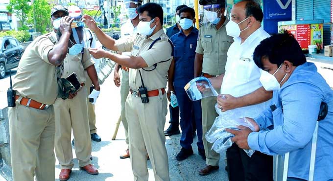 Face guards distributed to police personnel in Khammam