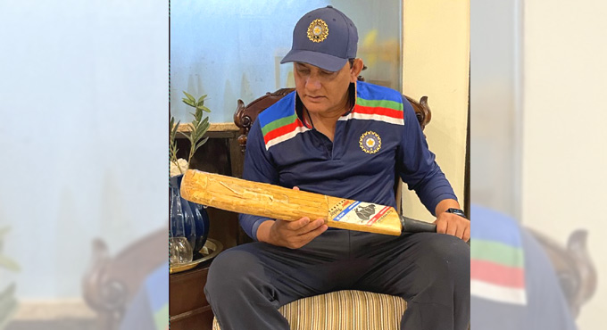 Former India captain Mohammad Azharuddin reunited with historic bat