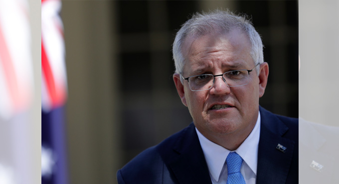 Australian PM defends ban on citizens returning from India