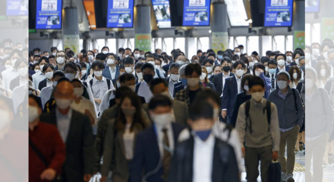 Japan set to extend virus emergency in Tokyo through May 31