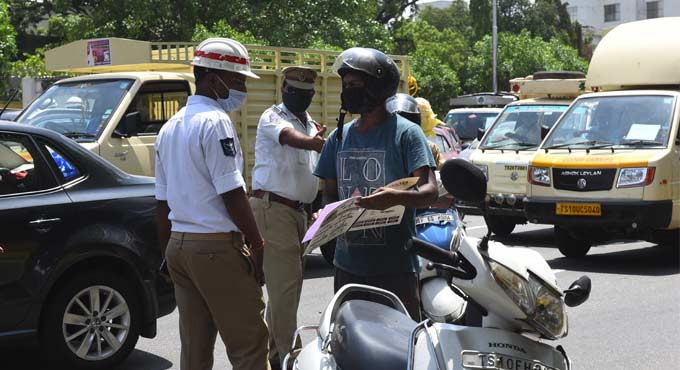 Mild traffic on Hyderabad roads as people venture out to buy essentials
