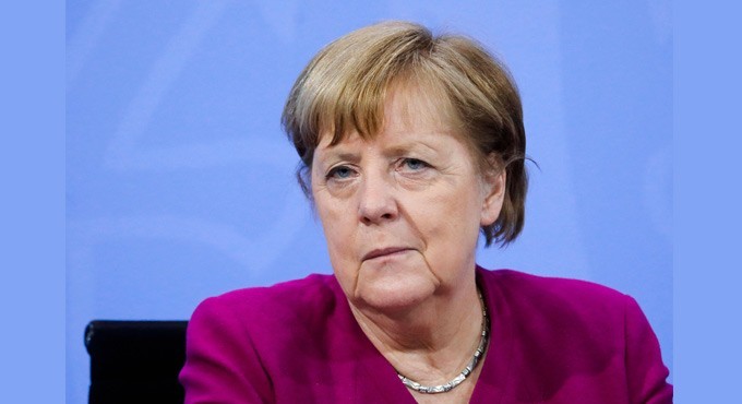 Angela Merkel defends patent protection for Covid vax