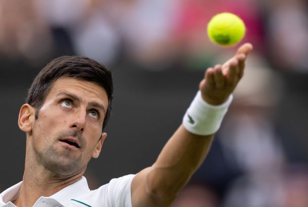 Welcome back, Wimbledon: Slam returns to rain; Djokovic wins