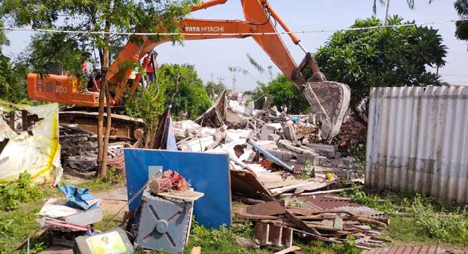 SCR demolishes 120 houses built on its lands in Kothagudem