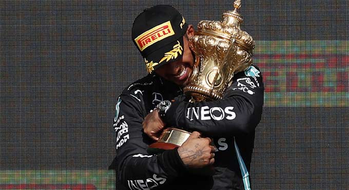 Lewis Hamilton wins F1 British GP despite penalty