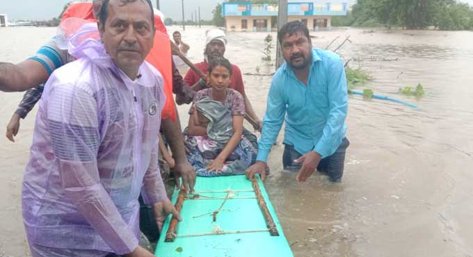 NDRF teams rescue mother, newborn from flooded colony in Nirmal