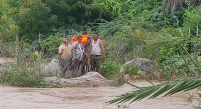 Three persons stranded in rivulet rescued near Korutla in Jagitial