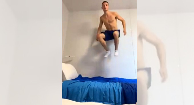 Watch: Olympics gymnast jumps on bed to prove it’s not anti-sex