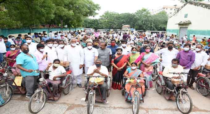 Tricycles given to differently-abled persons in Mancherial