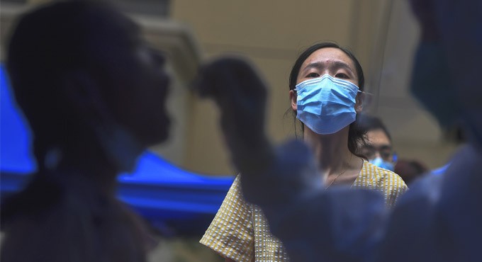 China forced Covid-19 origins probe to drop lab-leak theory: WHO