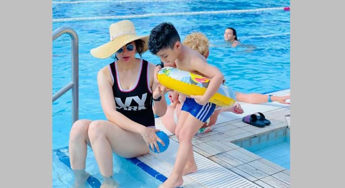 Kangana Ranaut chills out by the poolside with her nephew Prithviraj 