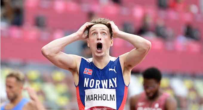 Warholm scorches Tokyo with world record run in 400m hurdles