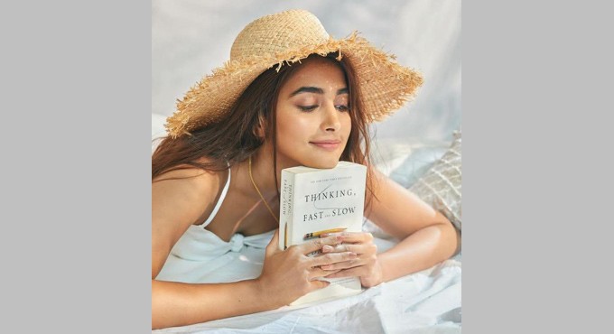 Pooja Hegde in a mood for some sunshine and a good read