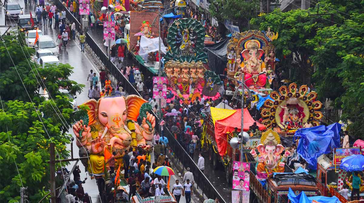 Rain fails to dampen Ganesh procession celebrations in Hyderabad