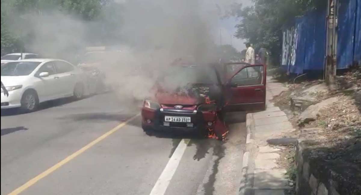 WATCH: Car catches fire in Banjara Hills, driver survives unhurt