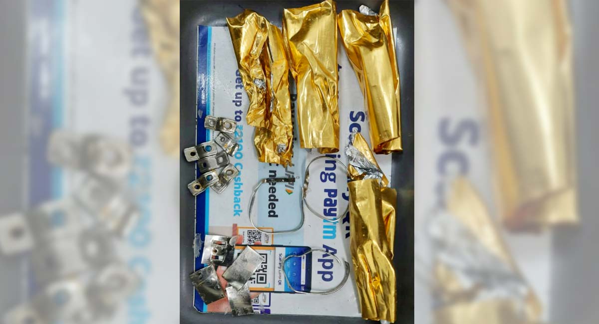 Man held at Hyderabad airport with gold in deodorant bottles, toy cars