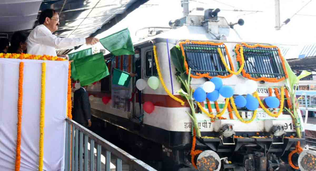 Vice President Venkaiah Naidu flags of Araku train
