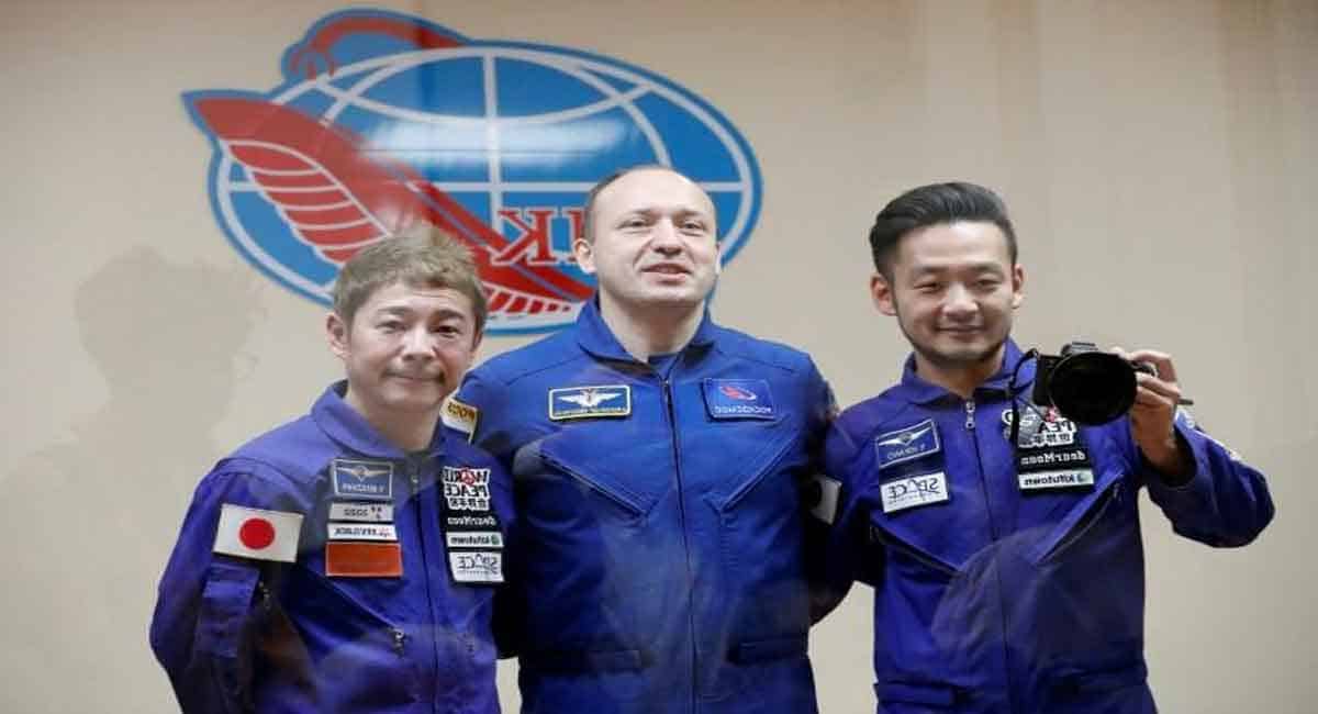 Japanese space tourists safely return to Earth