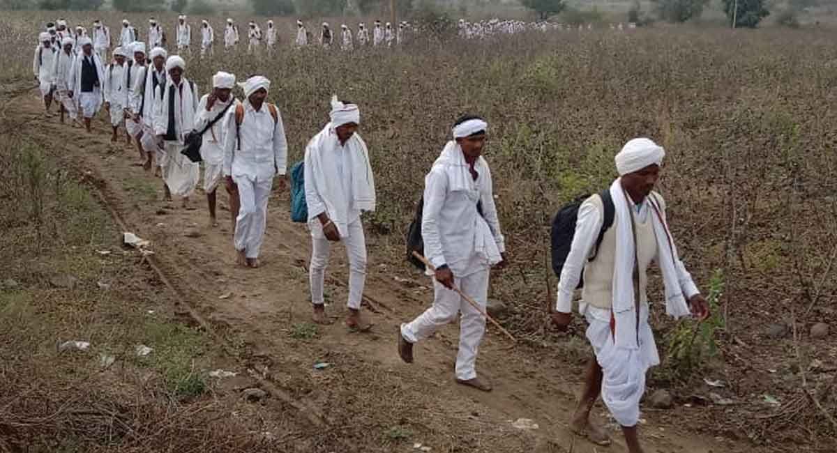 Mesrams set out to fetch Gangajal from river Godavari in Mancherial