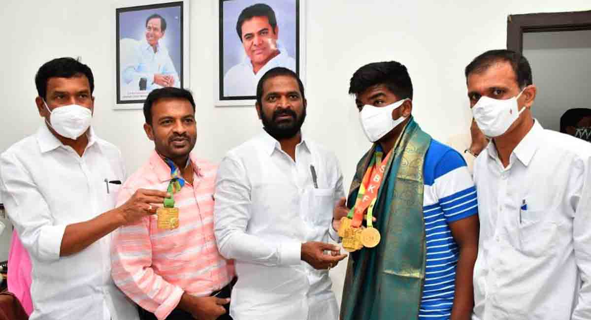 Minister pat for father-son duo excelling in sports
