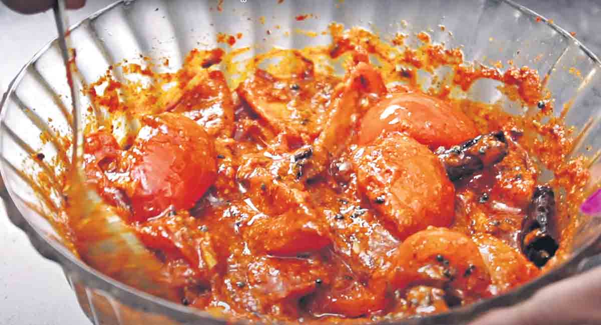 Lip-smacking tomato pickle, perfect accompaniment to upma, idlis and dosa