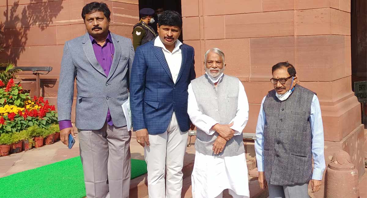 TRS MPs stage a walk out from Rajya Sabha in protest against Modi