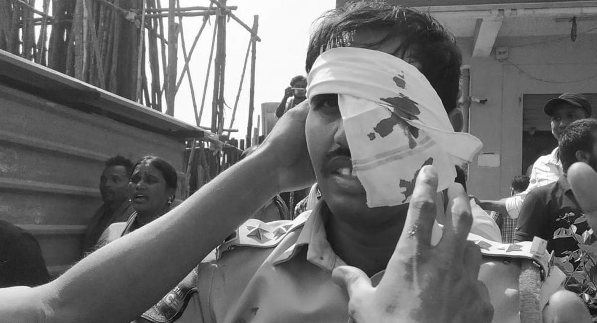 Police officer injured during TRS-BJP workers clash in Nizamabad