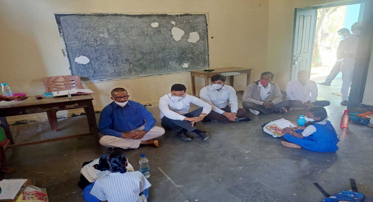 IAS officers sit on floor to interact with school children in Siddipet