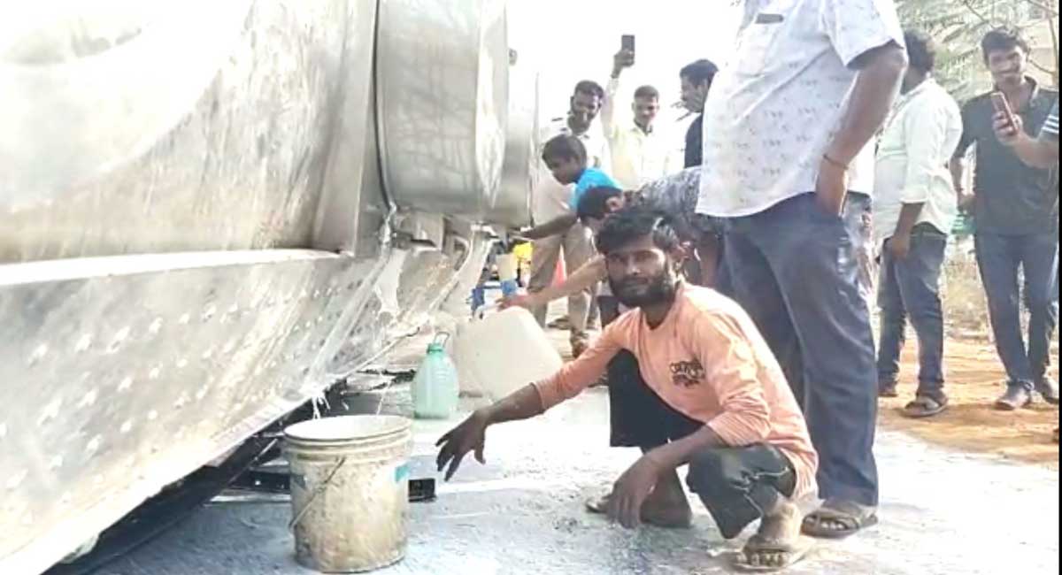 Watch: Milk container over turns near Hyderabad, scores gather with buckets to collect milk 