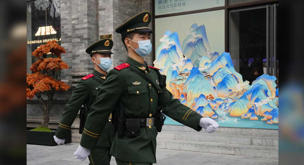 China locks down city of 9 million amid new spike in cases