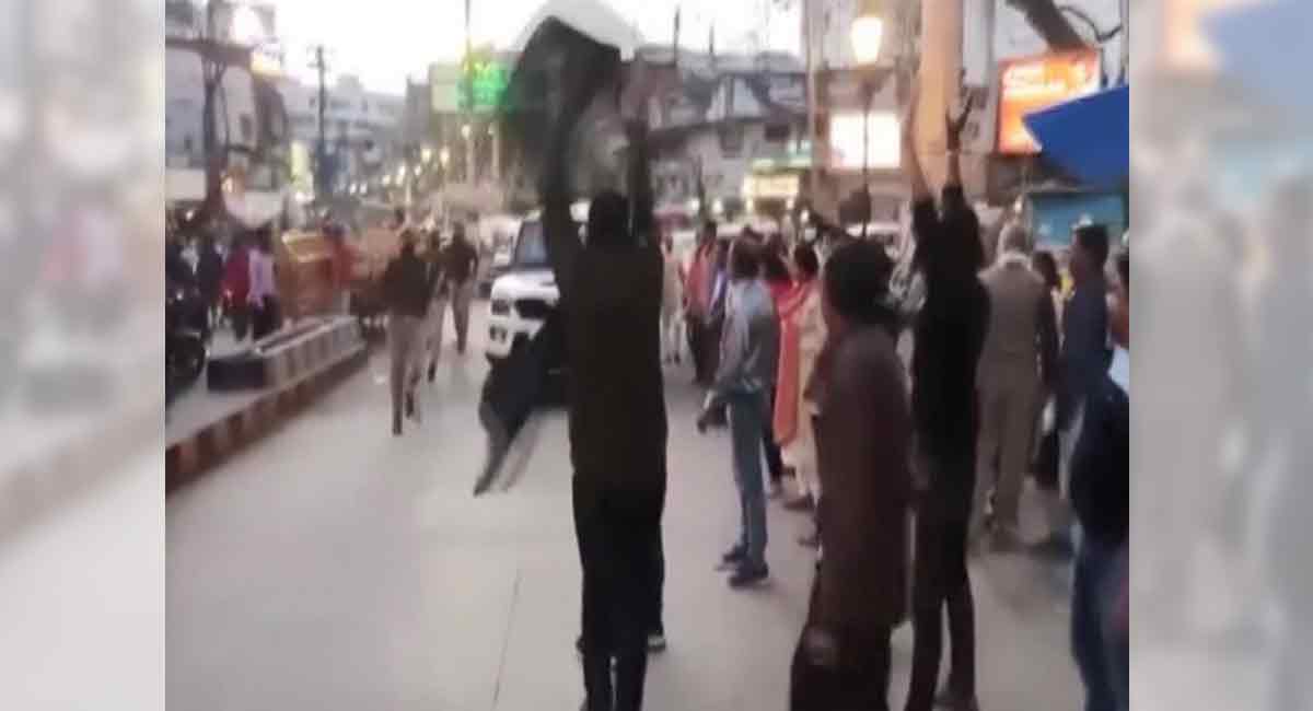 UP polls: Mamata shown black flags, sits on stair to watch Ganga Aarti in protest