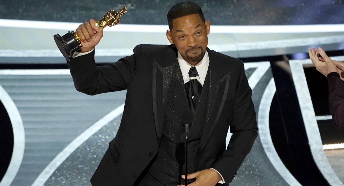 Will Smith wins Oscar for best actor and apologises for hitting Chris Rock