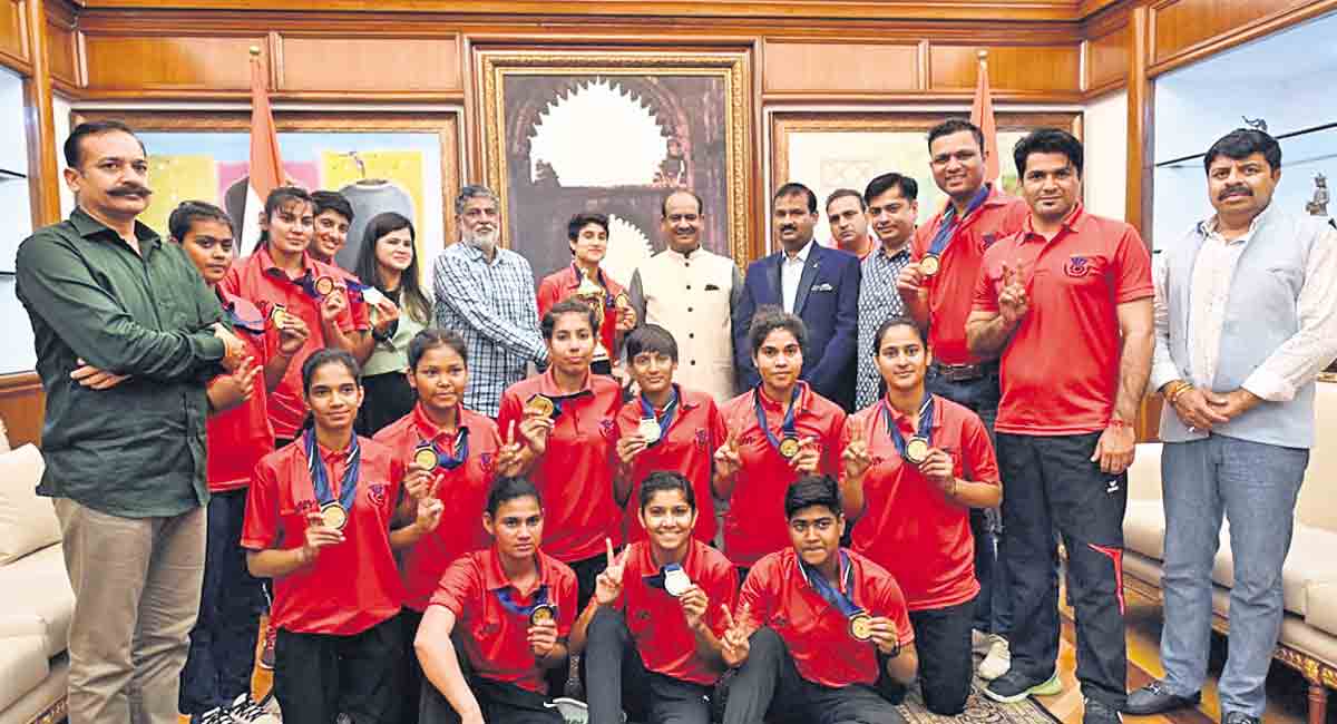 Speaker Om Birla pats women handball team