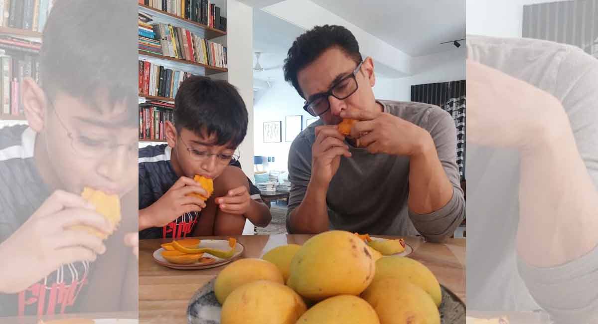 Aamir Khan and son Azad enjoy a mango binge