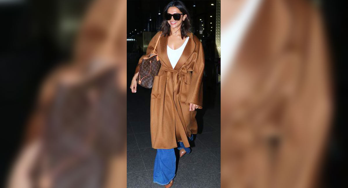 Deepika Padukone amps up her airport look in a tan overcoat