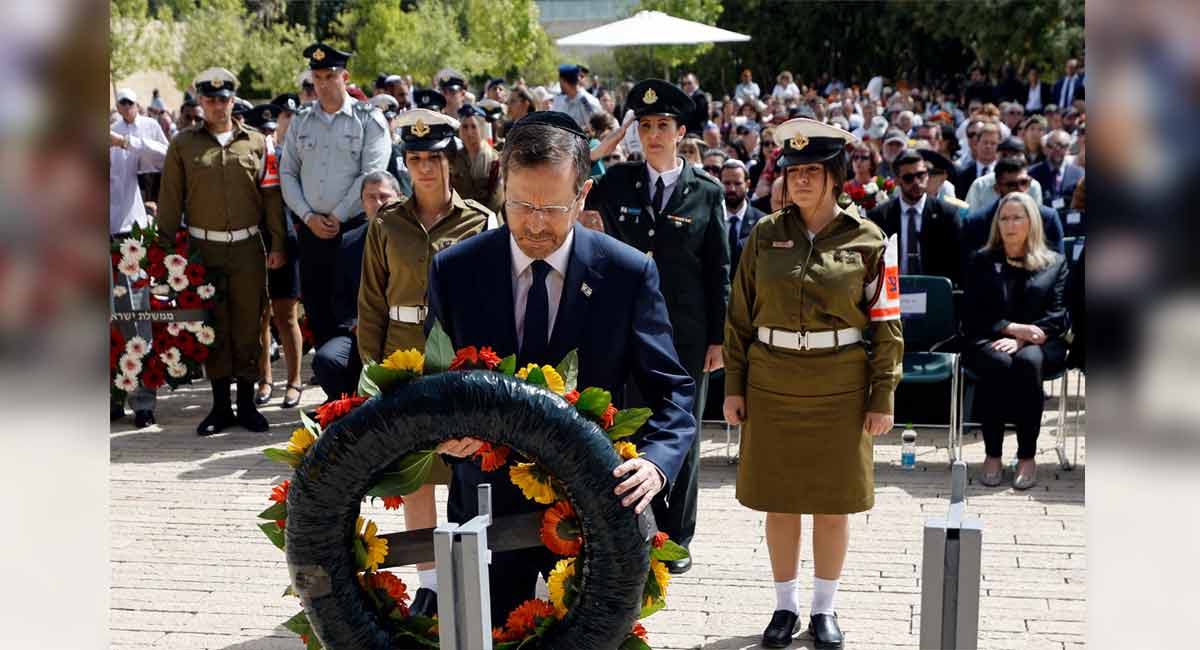 Israel halts for Holocaust day, honours 6 million Jews killed
