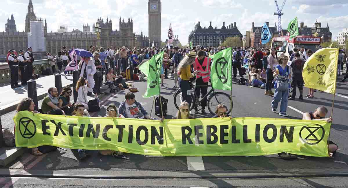 Climate activists block London bridges, UK oil terminals