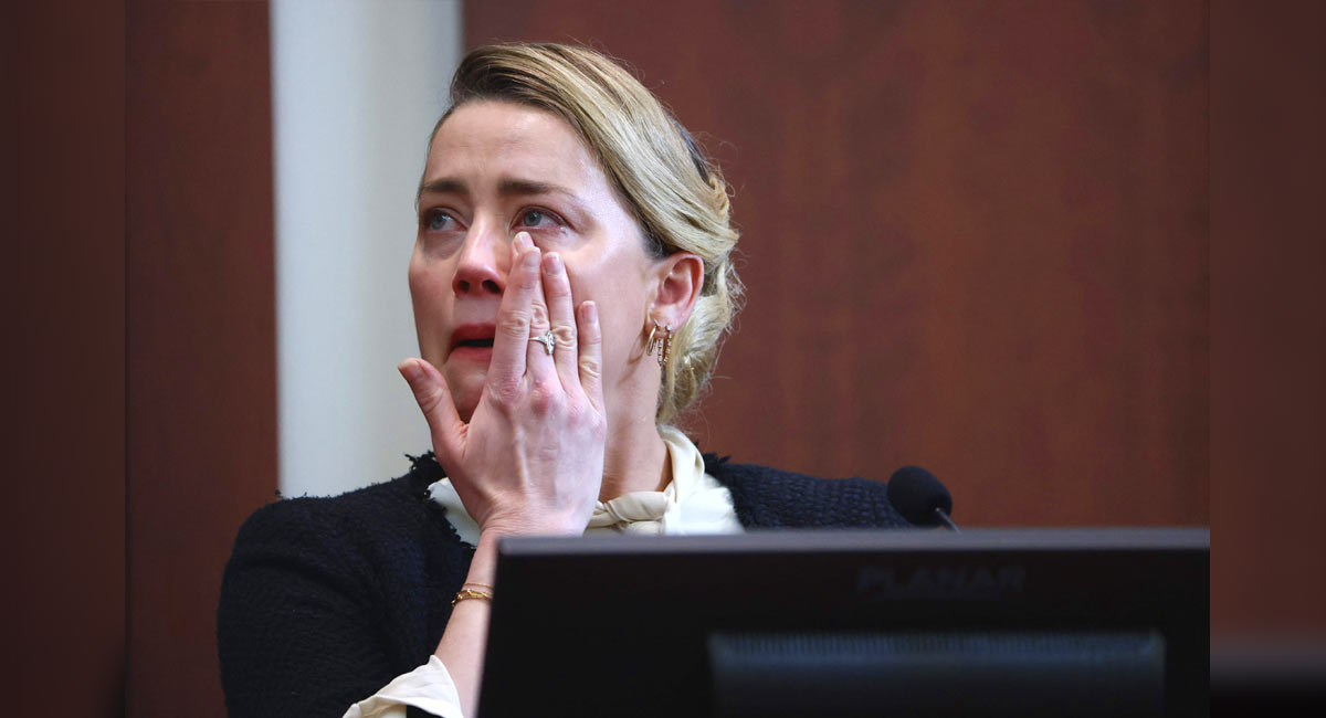 Amber Heard cries on witness stand while recounting sexual assault