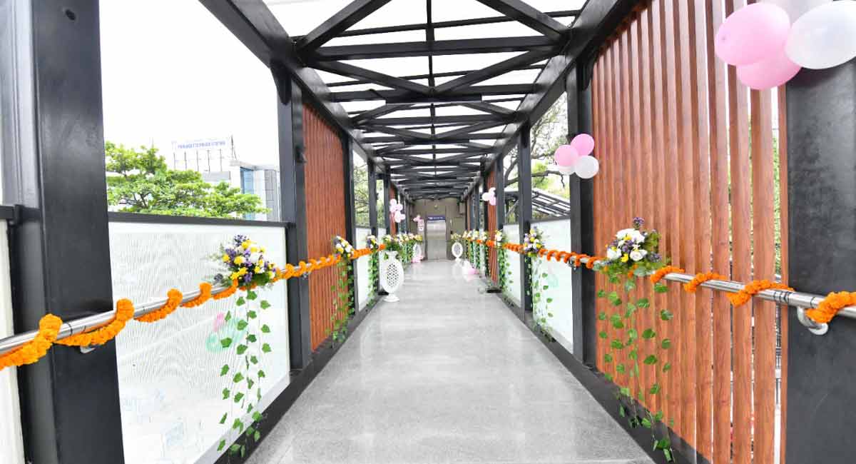 Now, walk across the busy Punjagutta junction on the brand new FoB