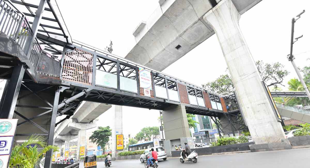 Now, walk across the busy Punjagutta junction on the brand new FoB