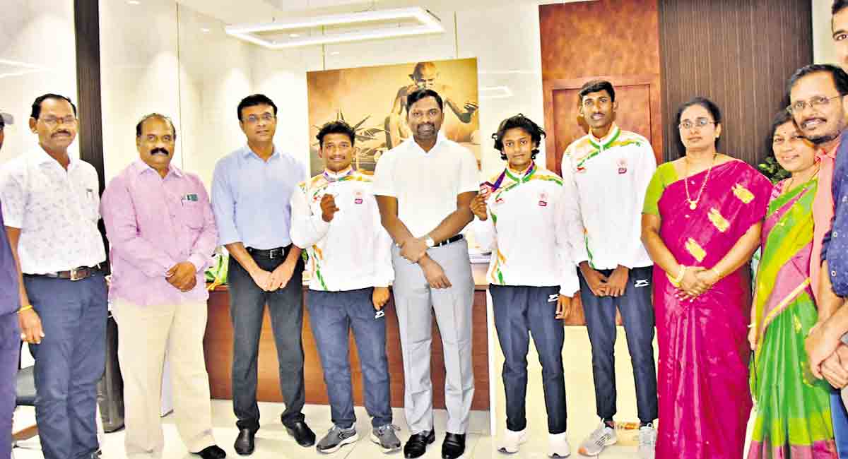 TSWREIS secretary felicitates athletes Ravi Kiran, N Mayavathi and Pranay