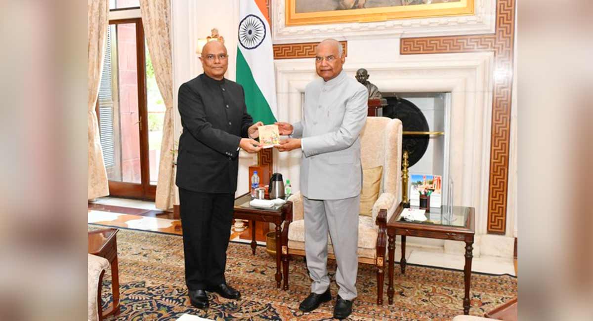 IAS officer Siva Prasad presents his new book on Bhagavad Gita to President