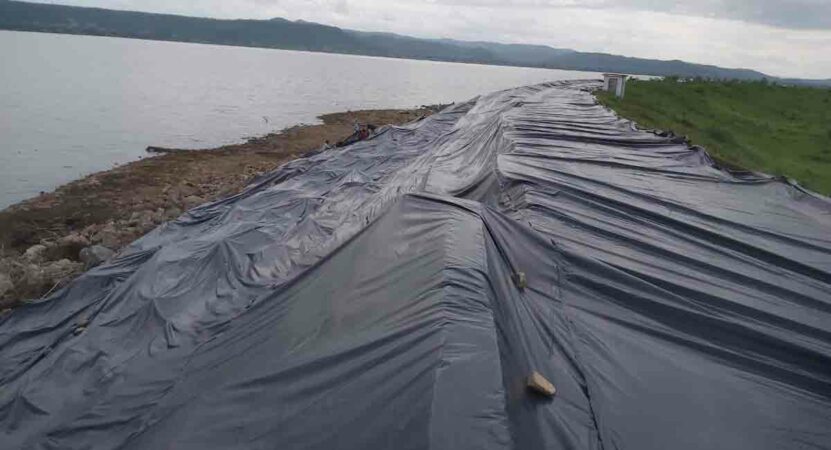 Officials have been using polythene covers to prevent bund breaches at the irrigation project, which is situated in a region that has been seeing heavy rains for the last two years.