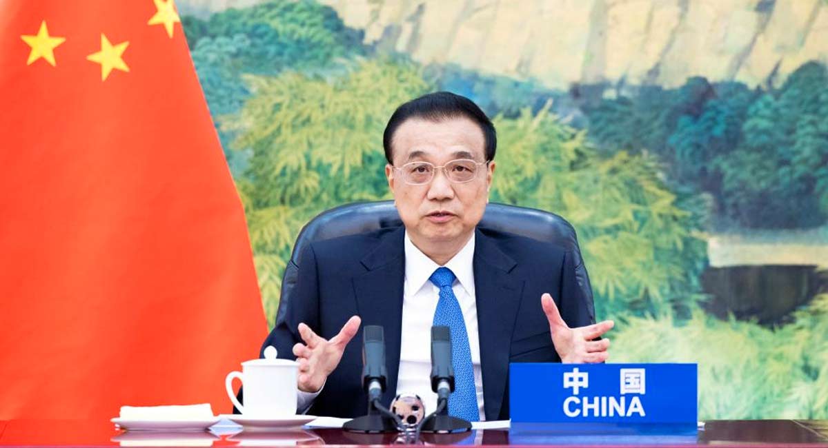 Chinese premier acknowledges slowing economy, cites unexpected shocks