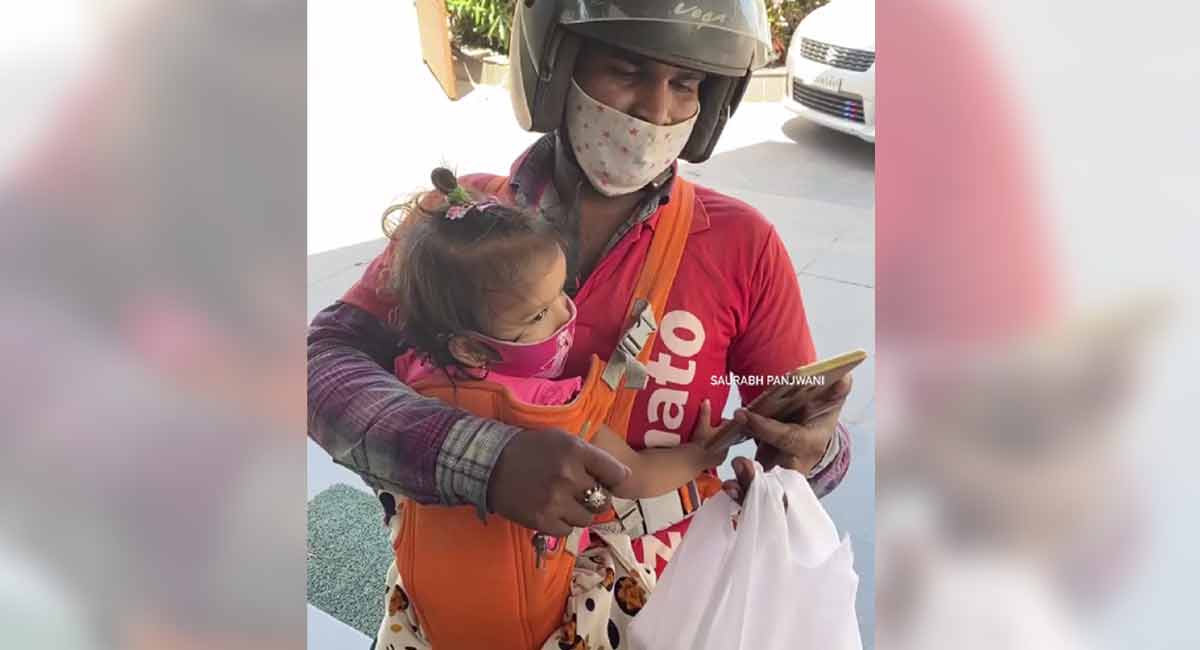 Delivery agent carries his toddlers to work, Zomato responds-Telangana ...