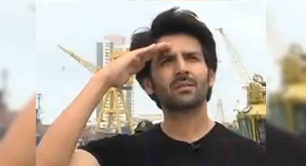 Netizens fume over Karthik Aaryan’s casual attire while Navy officers give formal salute