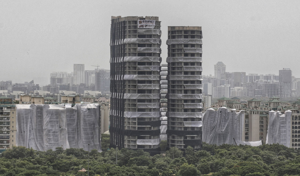 Residents of two housing societies near Noida’s Supertech Twin Towers evacuated