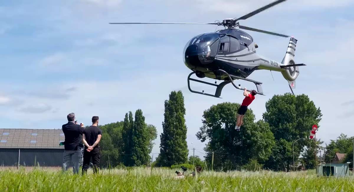 YouTubers smash Guinness World Record by doing 25 pull-ups from helicopter