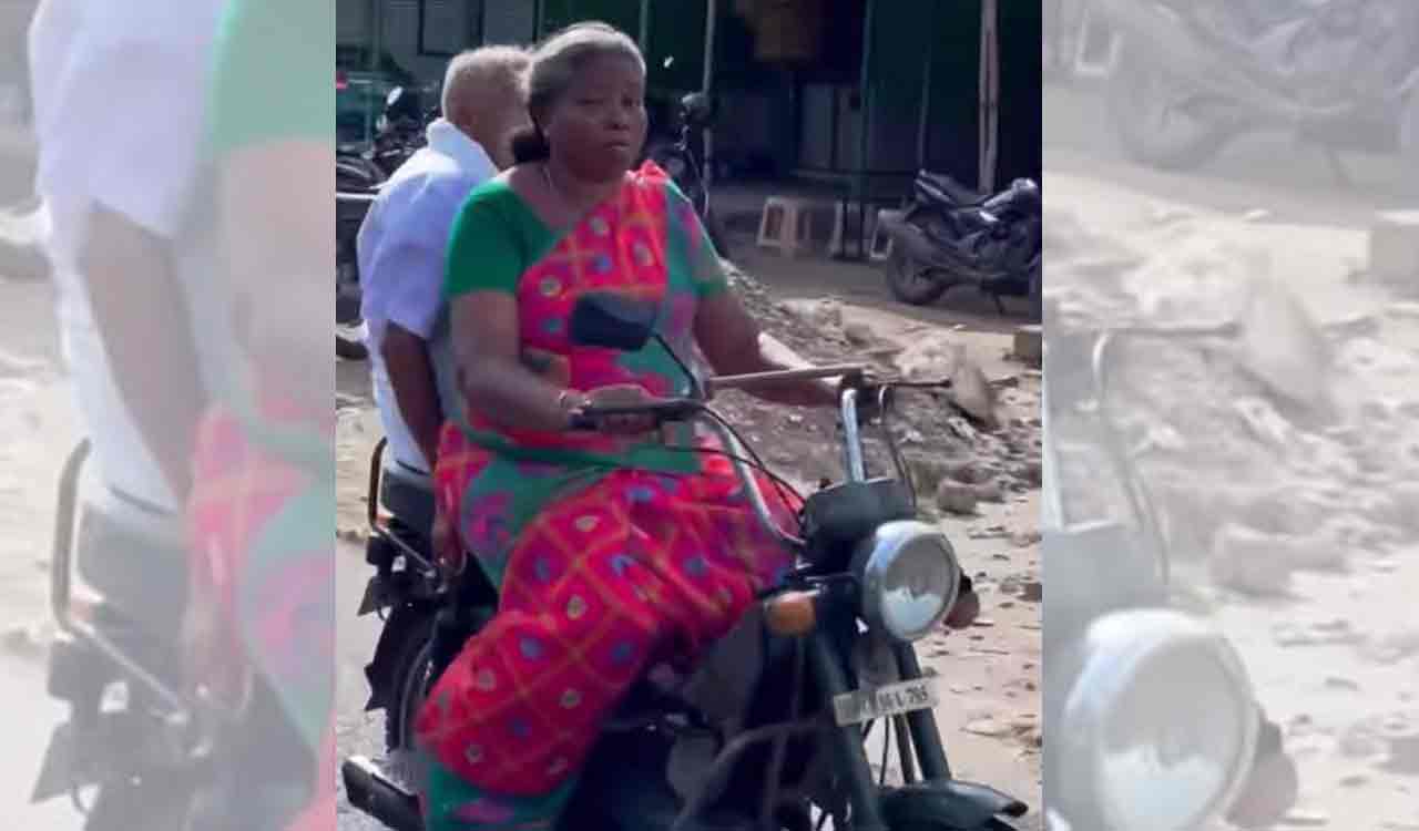 Watch: Elderly woman riding moped as her husband sits behind wins hearts