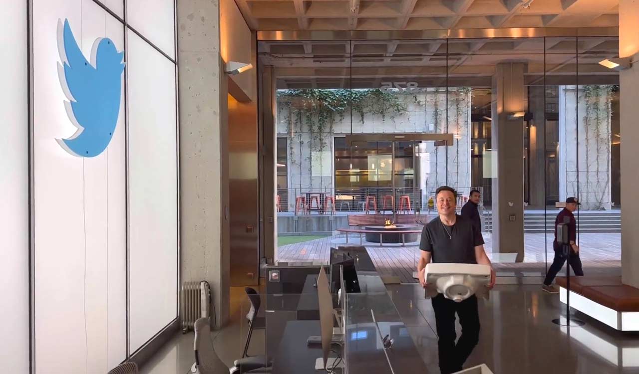 Elon Musk visits Twitter HQ, with a sink in his hand
